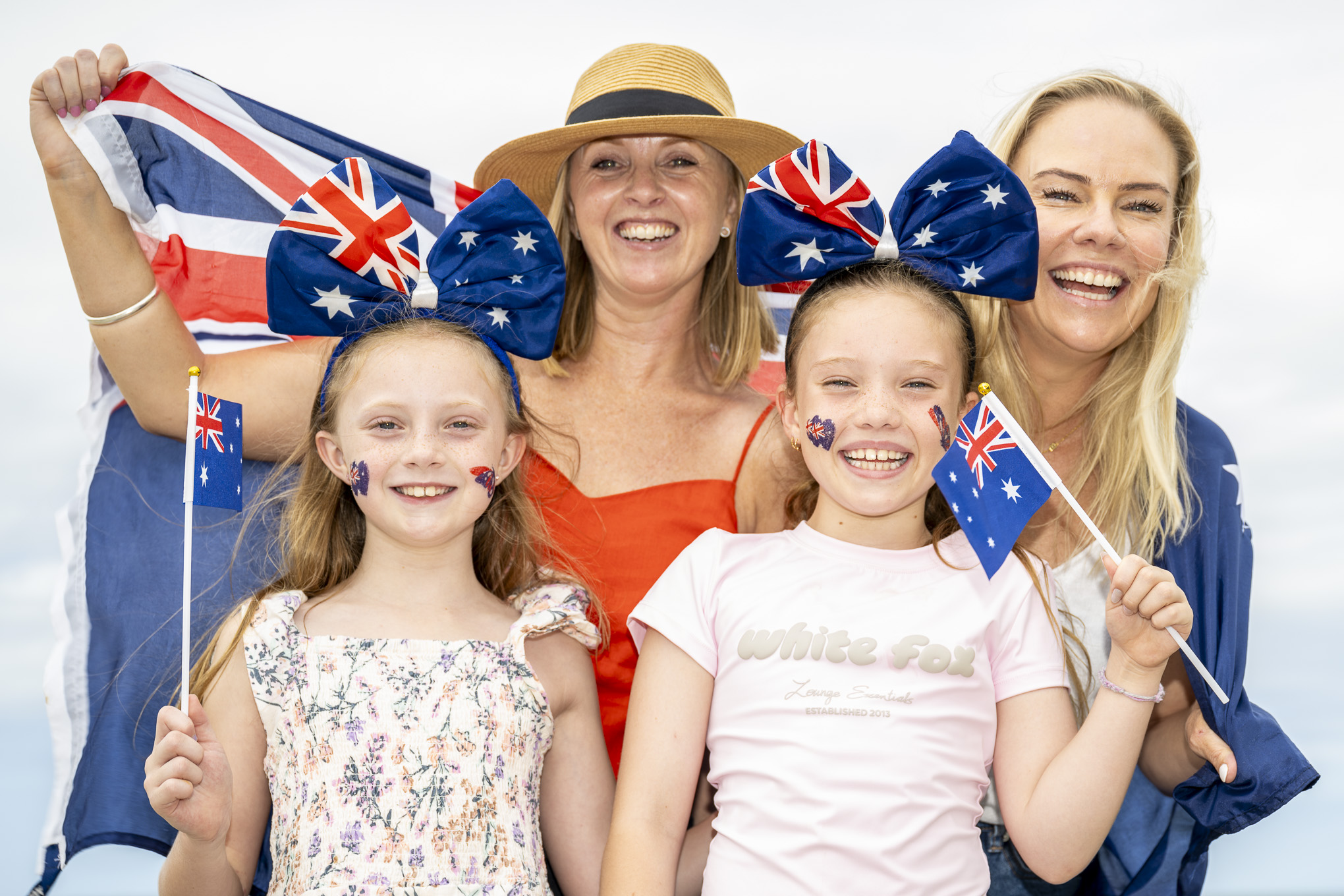 Kellie Fonseca, Georgia Fonseca, 8 Belle Russell, 8 and Kim Russell  pose for a photo in Cronulla at the beach on Australia Day.